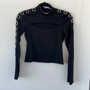 Black long sleeve shirt with round neck collage and silver grommets.